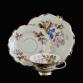 Kremowa porcelana zdobiona motywem kwiatowym
