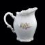 Dzbanek do mleczka z białej porcelany zdobionej i złoconej