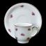 Dawna biała porcelanowa filiżanka zdobiona różyczkami